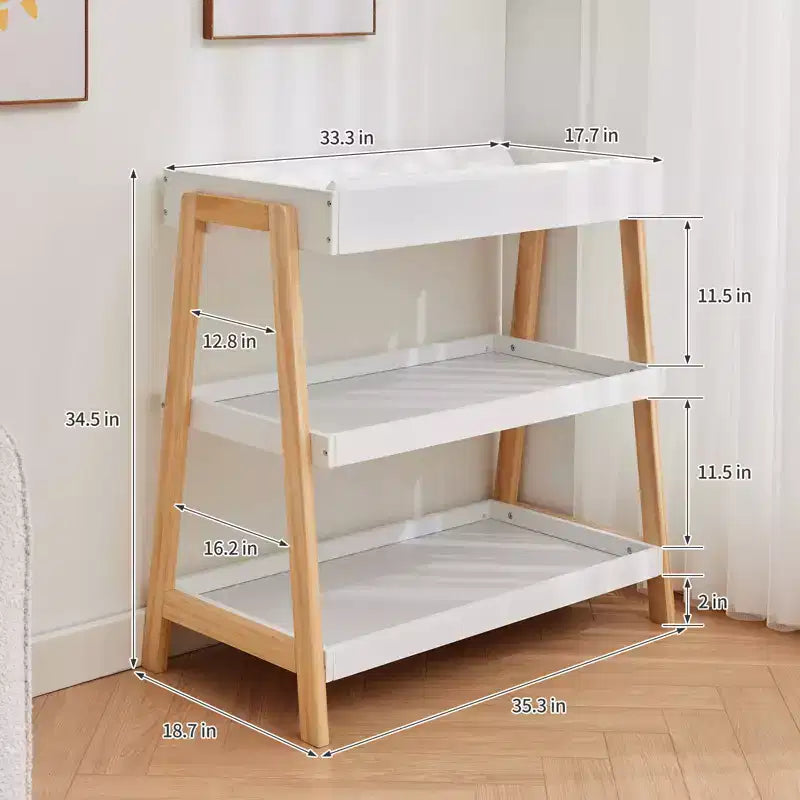 Fasciatoio portatile moderno e compatto con materassino impermeabile e 2 ripiani portaoggetti per neonati e bambini.