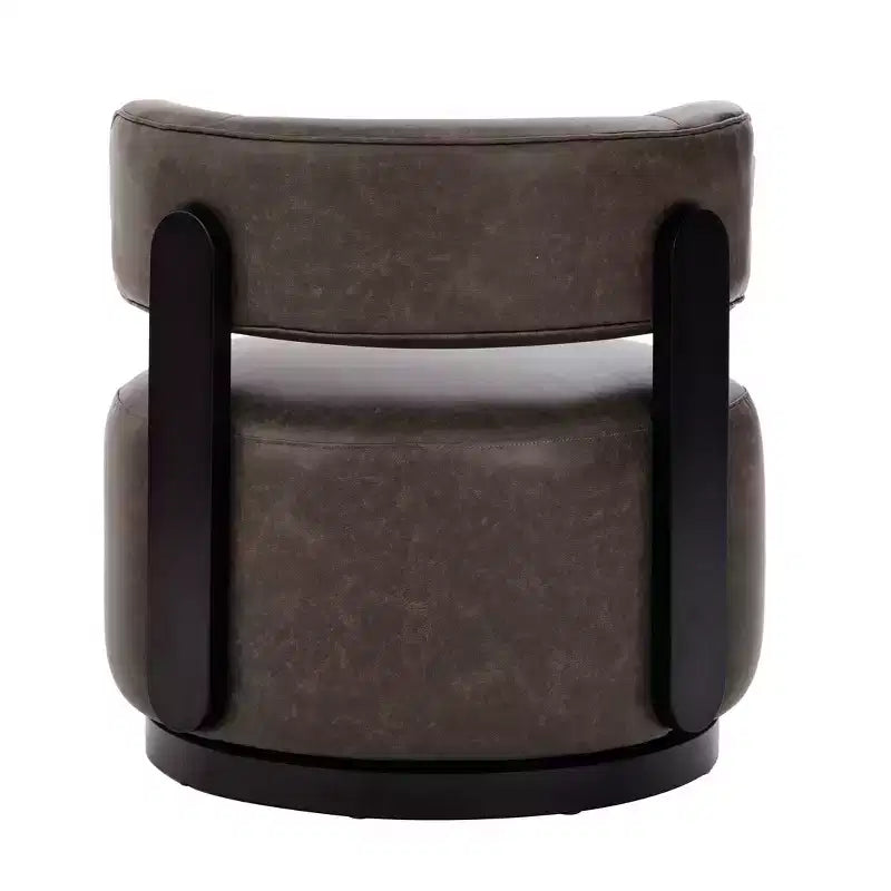 Poltrona girevole club Christopher Knight Home Emile in similpelle con struttura in legno di gomma